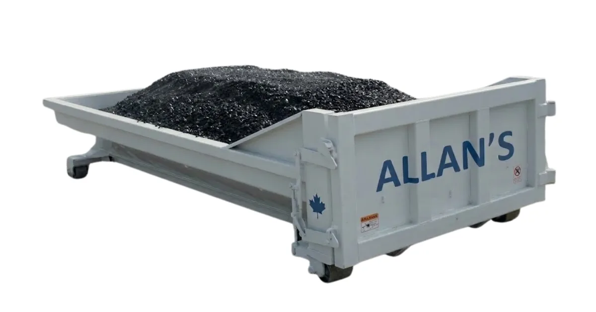 Asphalt loaded in a roll-off bin