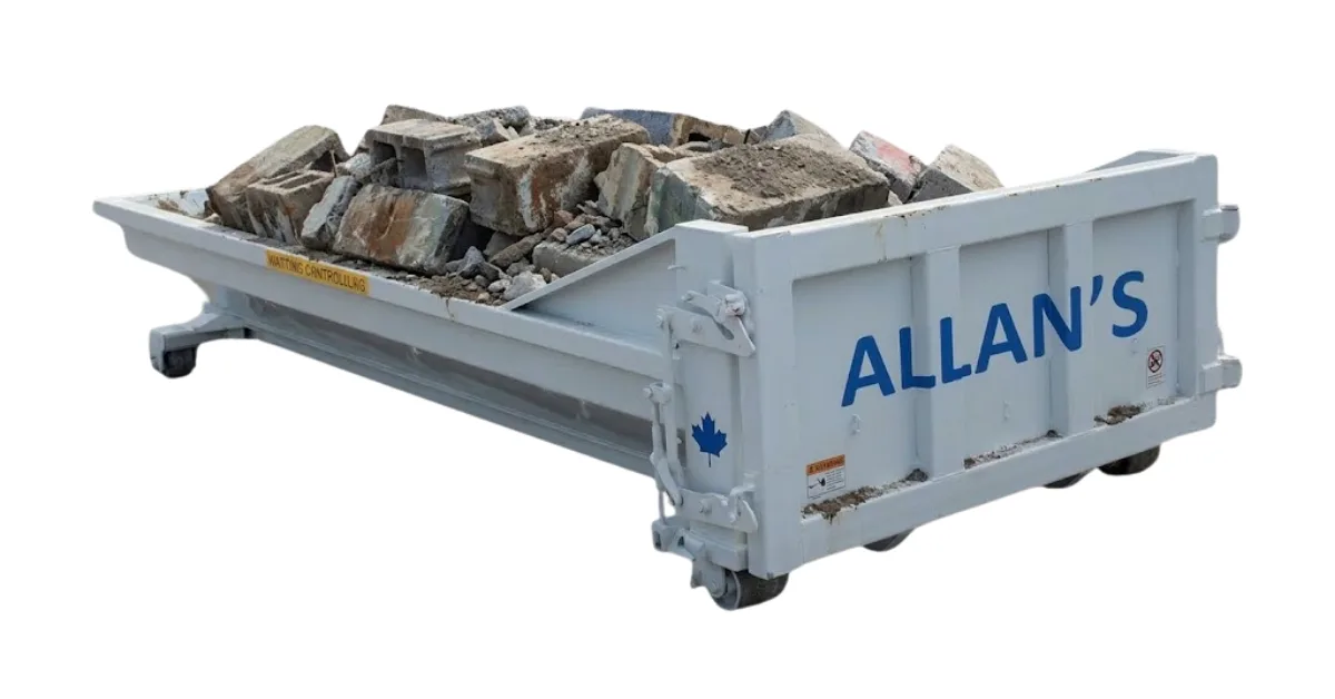 Dry concrete loaded in a roll-off bin